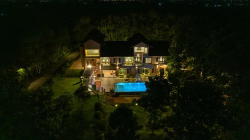 an aerial view of a large house at night at Vana Kiri Land in Ban Thung Sam Sao