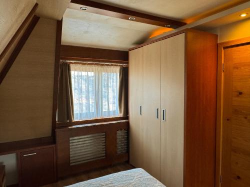 Postel nebo postele na pokoji v ubytování Vip Apartments Kopaonik