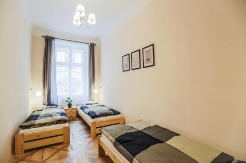Postel nebo postele na pokoji v ubytování Accommodation Smečky 14