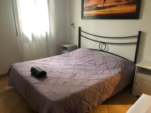 Postel nebo postele na pokoji v ubytování Il Cortile del Contadino