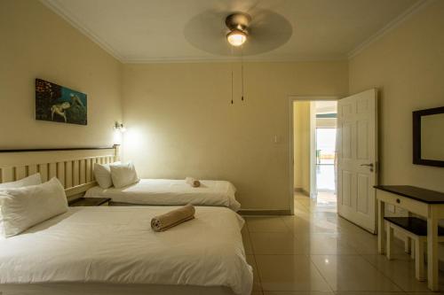 Katil atau katil-katil dalam bilik di Saints View Resort Unit 14