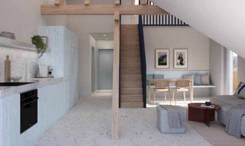 a kitchen and living room with a couch and a table at stuub schluchsee in Schluchsee