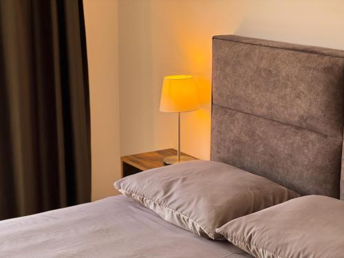 Postel nebo postele na pokoji v ubytování Vip Apartments Kopaonik