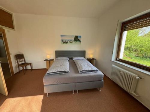 Postel nebo postele na pokoji v ubytování Schöne Wohnung mit Erker