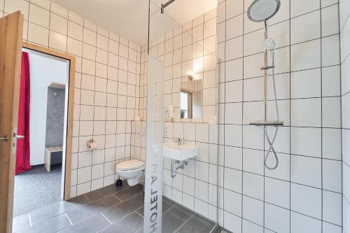 Koupelna v ubytování Hotel am Interpark