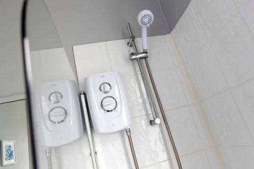 a shower in a bathroom with a shower at Comfortable & very spacious home in Stockton-on-Tees