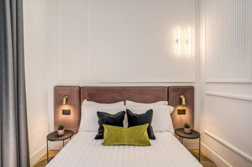 Letto o letti in una camera di Residenza Piranesi Boutique Hotel