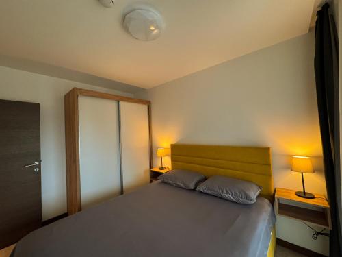 Postel nebo postele na pokoji v ubytování Vip Apartments Kopaonik