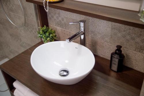 a white sink on a counter in a bathroom at La Volta in Trevi