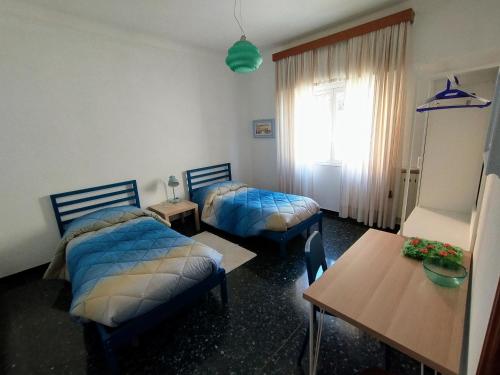 Ένα ή περισσότερα κρεβάτια σε δωμάτιο στο Large accomodation near the sea with parking