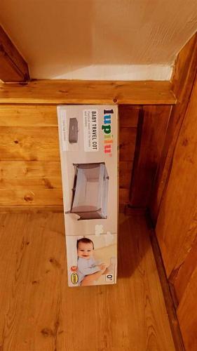 a box with a baby inside of it at Ruralna kuća za odmor Brezanka, Zagrebačka ulica 21 Gornja Stubica in Gornja Stubica