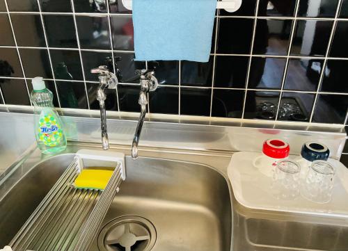 a kitchen sink with aainerroth sidx sidx sidx sidx at Warm House6 in Sapporo