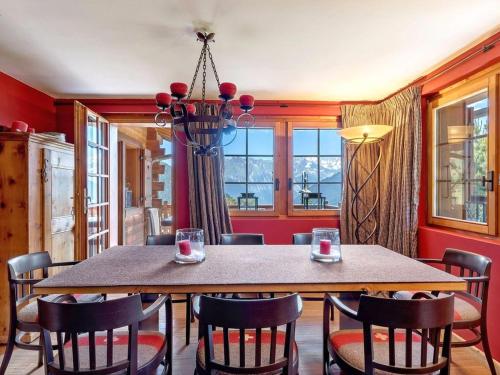 a dining room with a table and chairs at 5 bedroom luxury Chalet by Dieckereise in Verbier