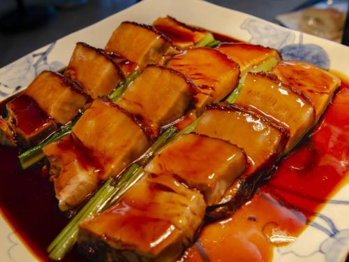 a plate of food on a plate with food at Hotel Den Haag Huis Ten Bosch in Sasebo