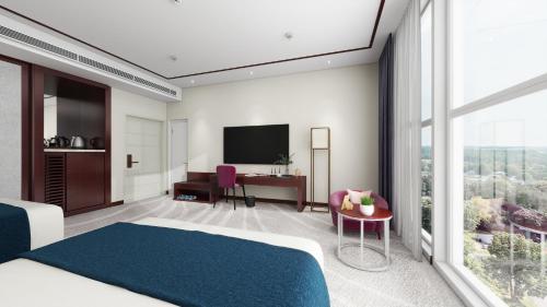 a hotel room with a bed and a large window at Bosai Hotel Shanghai Hongqiao Railway Station National Convention and Exhibition Center in Shanghai