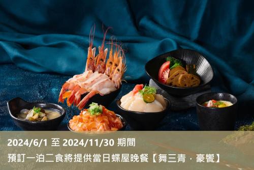 a plate of food with shrimp and other foods at Lakeshore Hotel Hsinchu in Hsinchu City