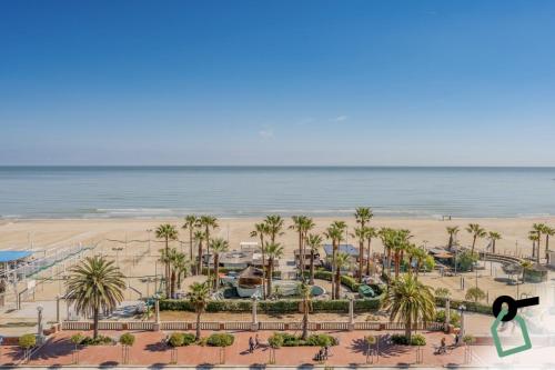 a view of the beach from the balcony of a resort at HOTIDAY Room Collection - Giulianova in Giulianova