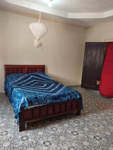 Katil atau katil-katil dalam bilik di Sunshine Guesthouse Bafuloto