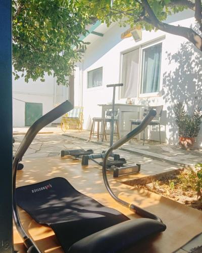 a group of exercise bikes on a patio at Lemon Tree Family House in Vrahati