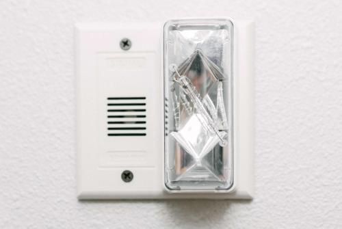 a white light switch with a diamond on it at Microtel Inn & Suites Springville in Springville