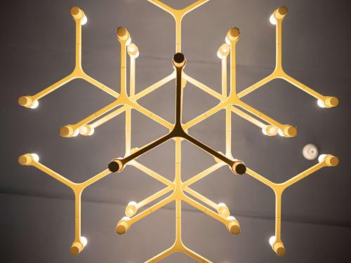 a close up of a gold molecular structure at Hotel Century Old Town Prague - MGallery Hotel Collection in Prague