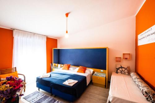 Кровать или кровати в номере La Favorita Hotel