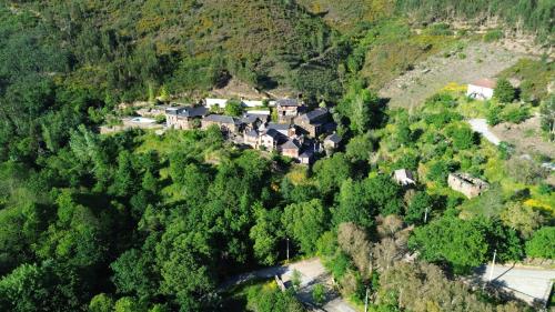 an aerial view of a village on a mountain at Casa da Ribeira- Riverside Retreat by Paiva River Beach in Arouca