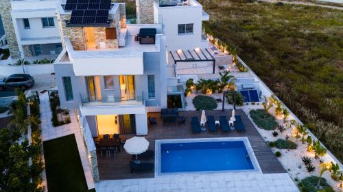 an aerial view of a house with a swimming pool at City Napa Seaview Villas - Villa 6 in Ayia Napa