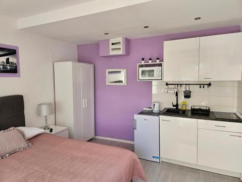 Apartments Benic with a heated pool