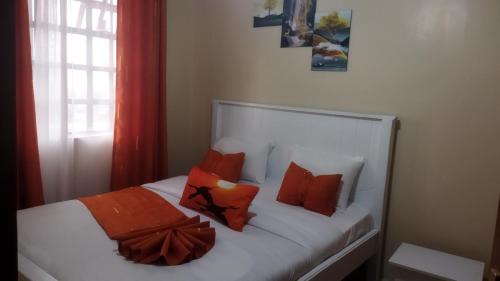 Postel nebo postele na pokoji v ubytování Lacasa accommodation