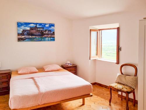 Postel nebo postele na pokoji v ubytování Villa u Gregoria