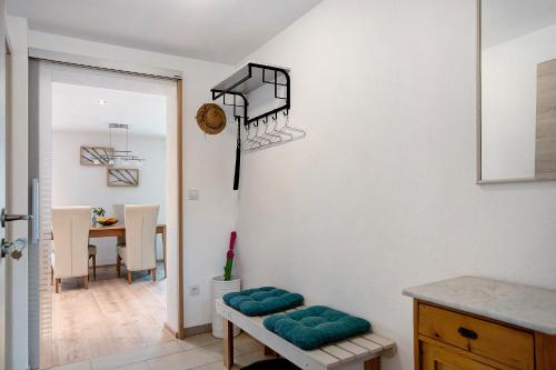 a kitchen and dining room with a table and chairs at Ferienwohnung Birke in Altusried