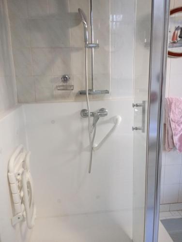 a shower with a glass door in a bathroom at Aix en Provence in Aix-en-Provence