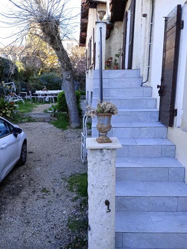 a vase on a pillar in front of a house at Aix en Provence in Aix-en-Provence