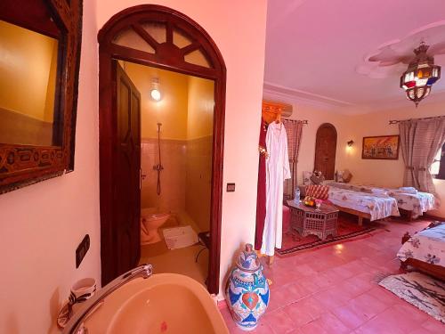 Katil atau katil-katil dalam bilik di Riad le Petit Jardin