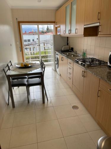 Kuchyň nebo kuchyňský kout v ubytování Apartamento Rio Vez