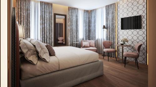 una camera d'albergo con letto e TV di Albergo San Marco a Venezia