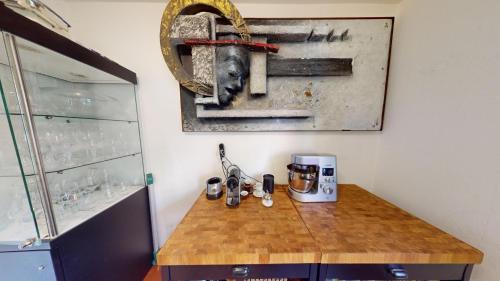 a kitchen counter with a coffee maker on top of it at 4 Zimmerwohnung mit grossem Garten in Chur