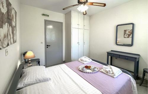 Postel nebo postele na pokoji v ubytování Lovely Apartment In Aghios Dimitrism