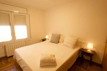 Ένα ή περισσότερα κρεβάτια σε δωμάτιο στο Apartament Roma