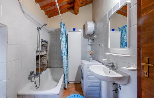 a bathroom with a sink and a toilet and a tub at Cafranceschino in Mercatello sul Metauro