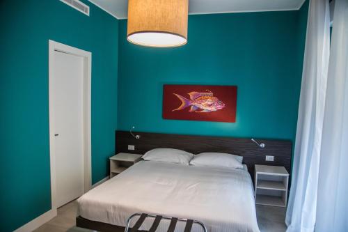 A bed or beds in a room at Casa Consani
