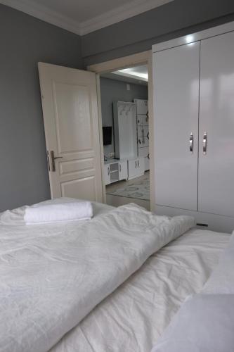 Katil atau katil-katil dalam bilik di Çam Suites