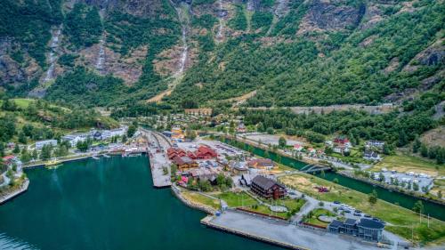an aerial view of a marina in the mountains at Flåmsbrygga Hotel in Flåm
