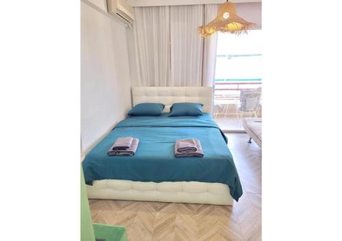 Ένα ή περισσότερα κρεβάτια σε δωμάτιο στο Elite 7