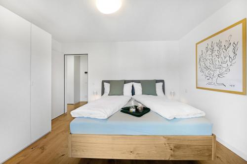 Ліжко або ліжка в номері Ferienwohnung Ascona Vista Verde