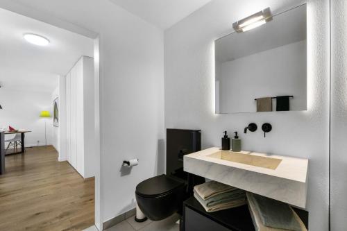 Ванна кімната в Ferienwohnung Ascona Vista Verde