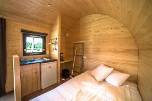 Krevet ili kreveti u jedinici u okviru objekta Amici Camping Urlaub am Effelder Waldsee