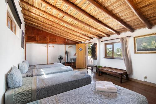 Giường trong phòng chung tại Quinta Alegre