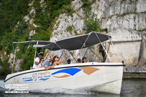 a group of people on a boat in the water at Brvnara Vila Promaja in Kladovo